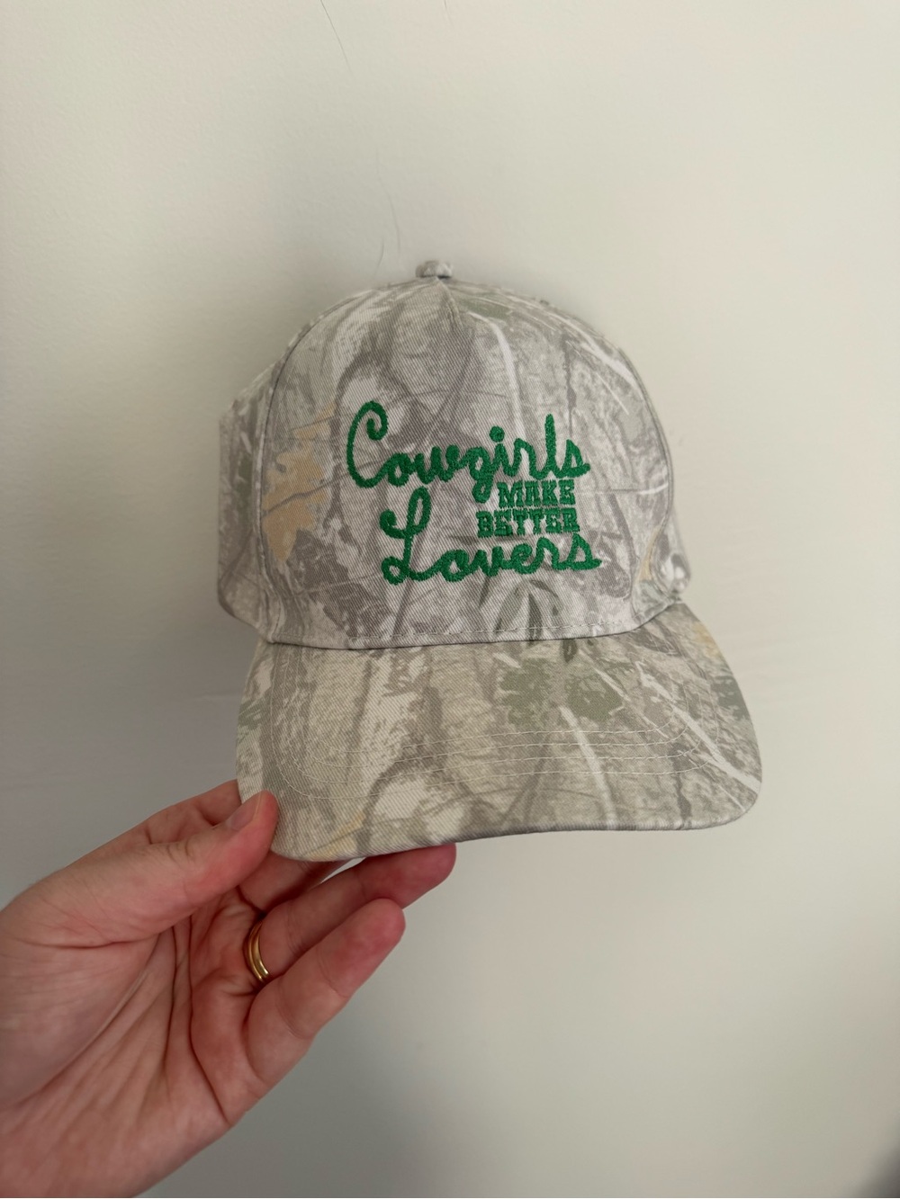 Cowgirls make better Lovers trucker hat